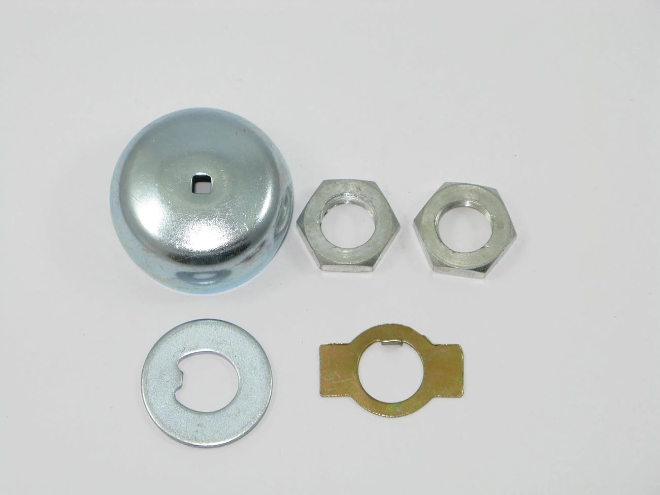 KIT CALOTA RODA DIANTEIRA ESQUERDA COM FURO VW FUSCA /74 ESQUERDO
