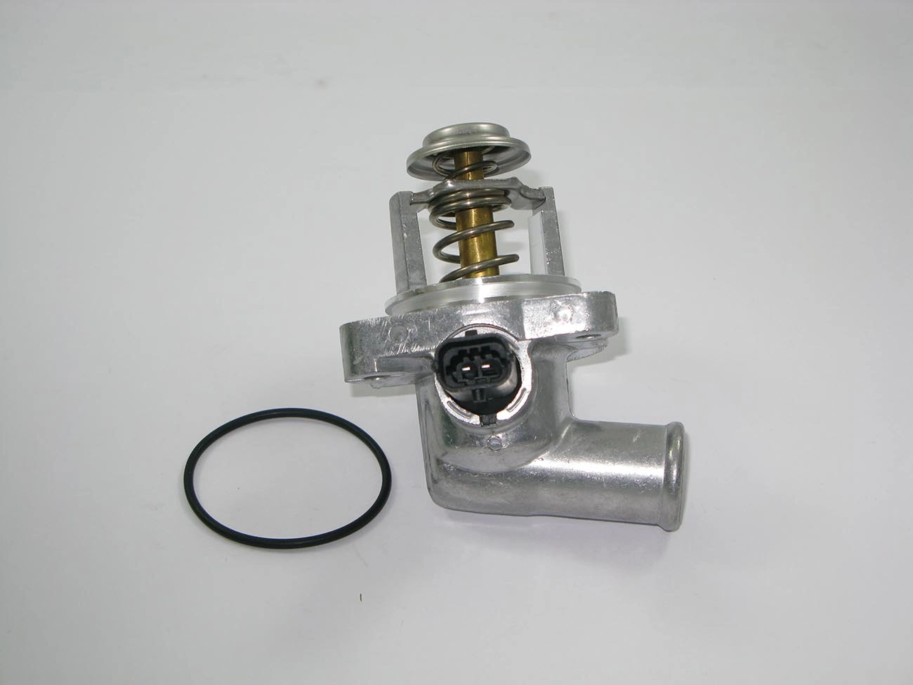 VÁLVULA TERMOSTÁTICA ELÉTRICA COM FLANGE ALUMÍNIO SENSOR MOTOR ZETEC ROCAM FLEX ALUMÍNIIO FORD FIESTA/KA/ECOSPORT 05/06