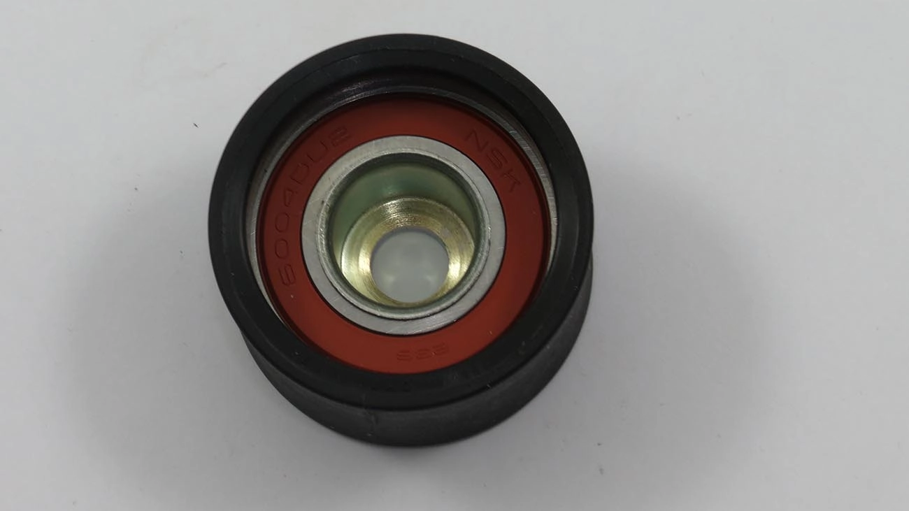 POLIA AUXILIAR CORREIA COMANDO FORD ESCORT 1.8 16V 97/01 - MONDEO 16V 94/98 - 10.30X48.20X29.20MM