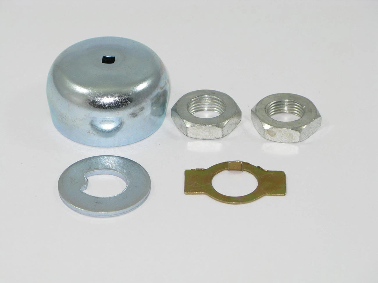 KIT CALOTA RODA DIANTEIRA ESQUERDA COM FURO VW FUSCA /74 ESQUERDO