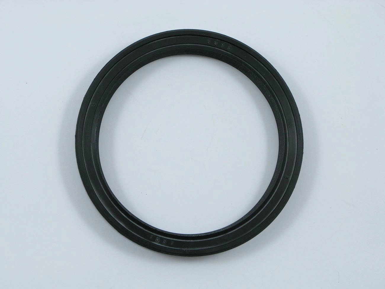 RETENTOR MOTOR MWM D-232 V8/V12 - TAMPA FRONTAL