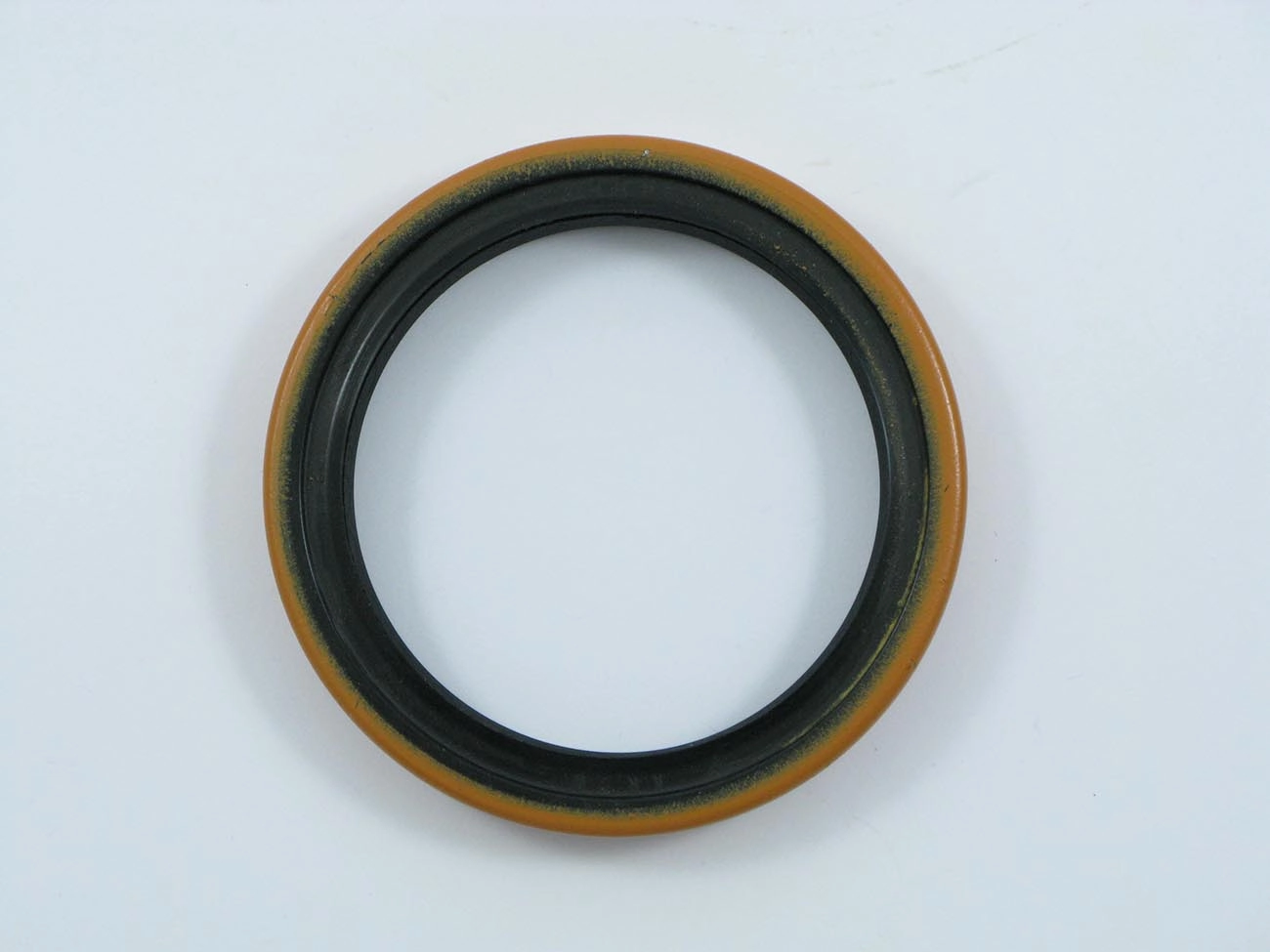 RETENTOR CÂMBIO FLANGE TRASEIRO VW 7.100/8.140/8.150 - 69,90X90X12,70MM
