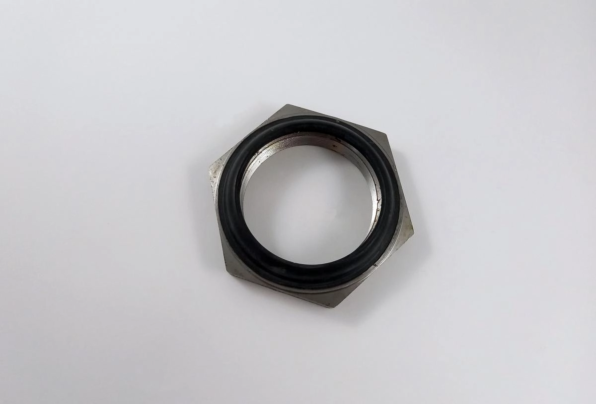 PORCA DA CARCAÇA COM RETENTOR - FORD F750/F13000 /92 - GM D70 - VW 13130/14140 - EXTERNA COM RETENTO