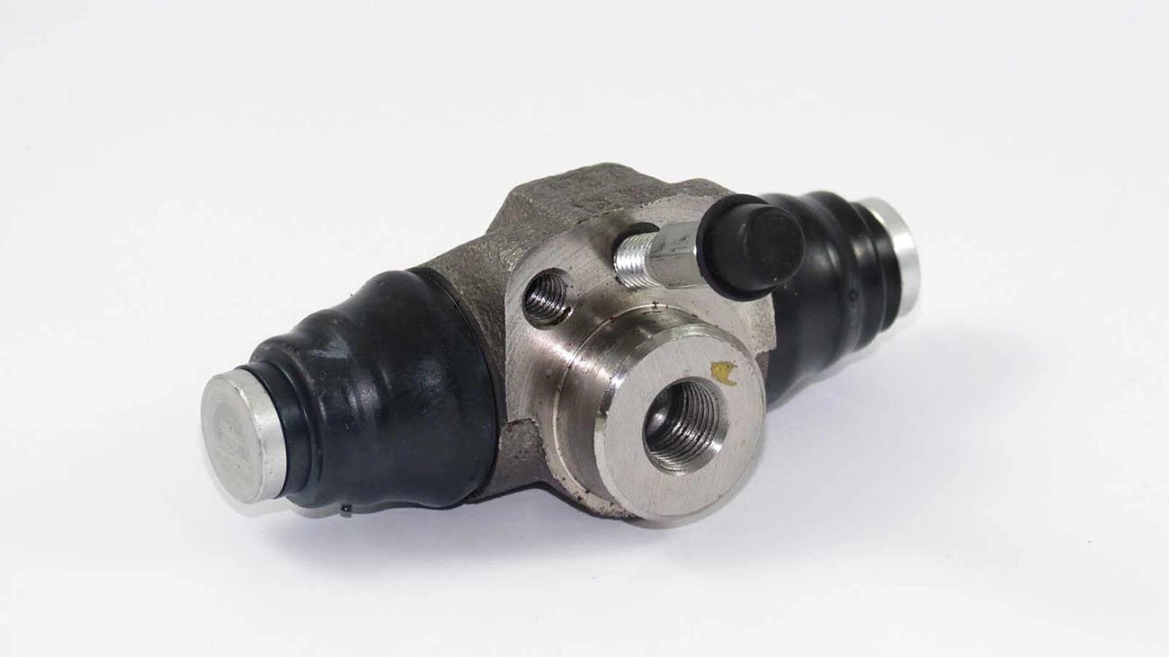 CILINDRO RODA FREIO TRASEIRO LADO DIREITO/LADO ESQUERDO TRASEIRA VW PARATI/QUANTUM TODOS SAVEIRO 87/97 SANTANA 95/ 11/16 17,46MM