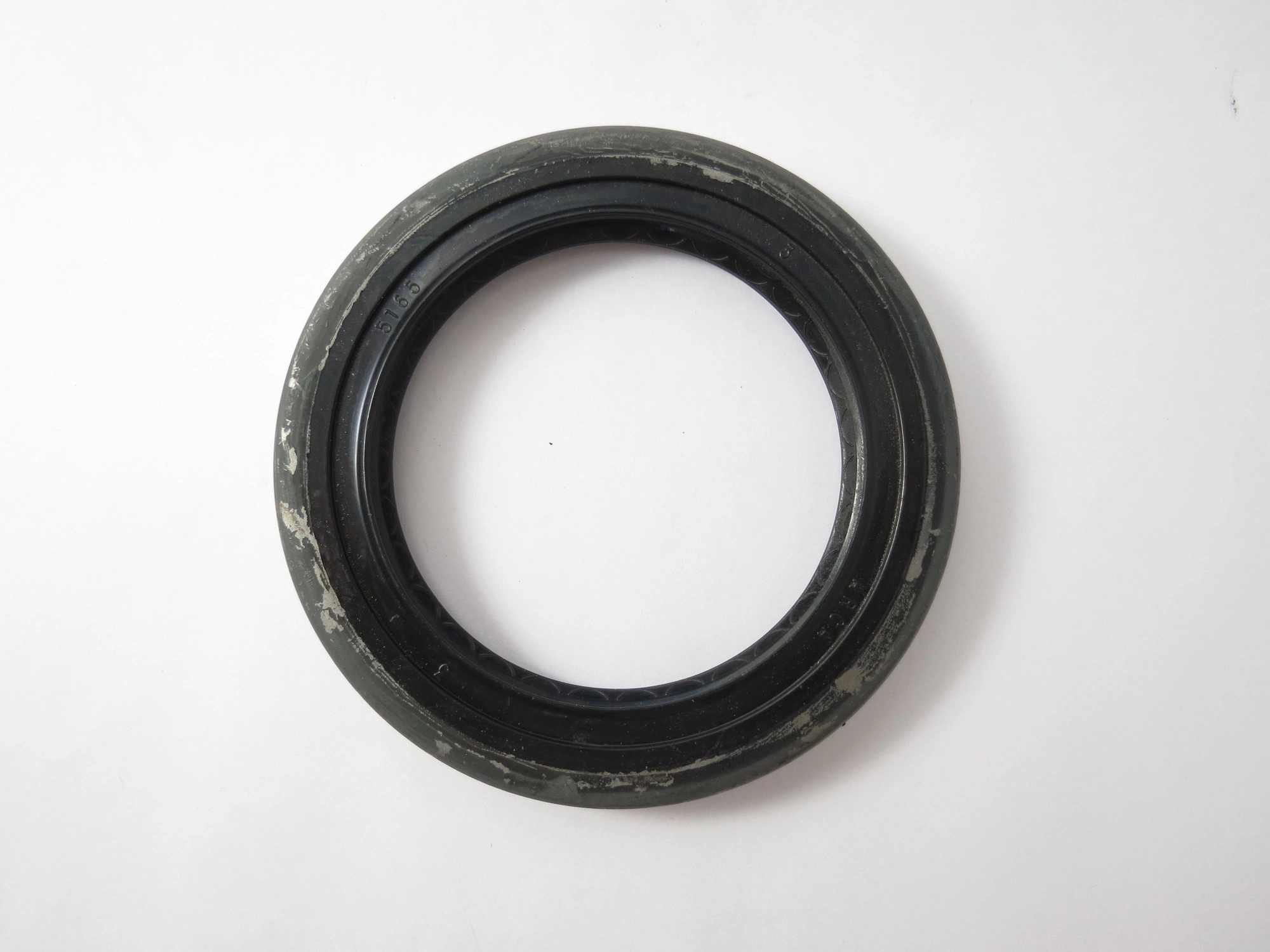 RETENTOR PINHÃO DIFERENCIAL 69,80X98,50X11,80X17,70MM TIMKÃO VW 11.130/11.140/12.140/13.130/14.140/14.210/22.140