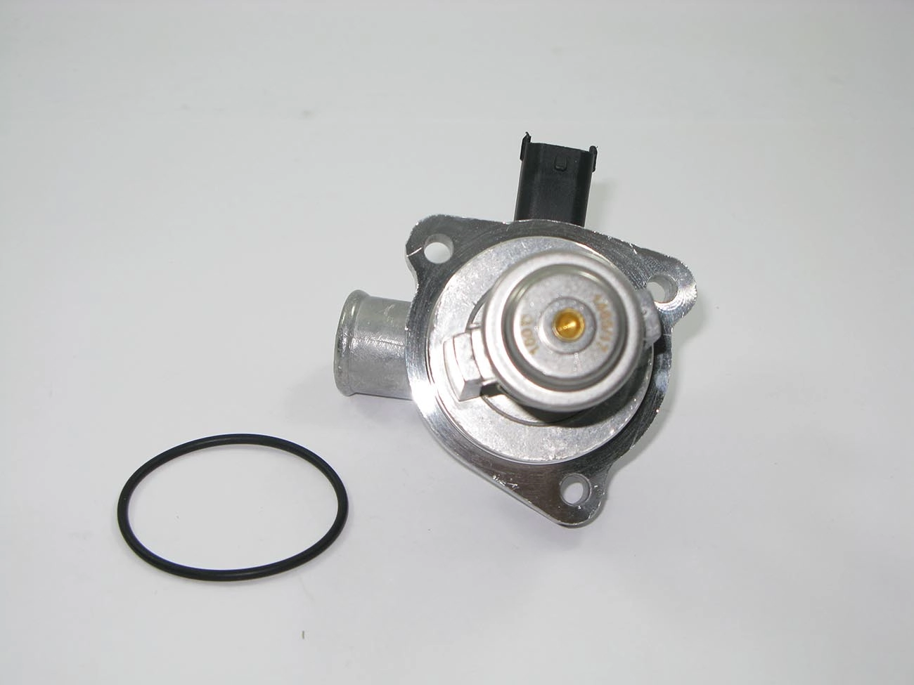VÁLVULA TERMOSTÁTICA ELÉTRICA COM FLANGE ALUMÍNIO SENSOR MOTOR ZETEC ROCAM FLEX ALUMÍNIIO FORD FIESTA/KA/ECOSPORT 05/06