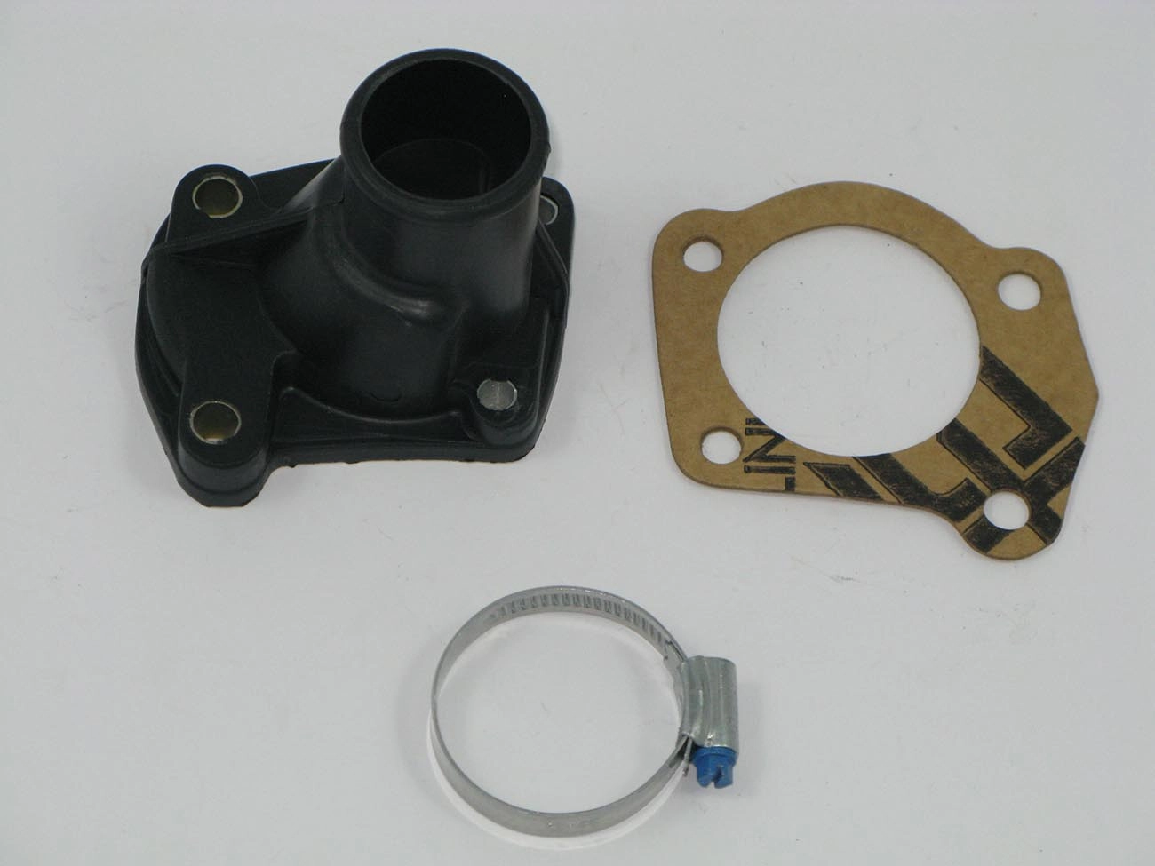 KIT FLANGE/TAMPA VÁLVULA TERMOSTÁTICA PLÁSTICO FIAT UNO/PREMIO/ELBA/FIORINO EXCETO FIRE
