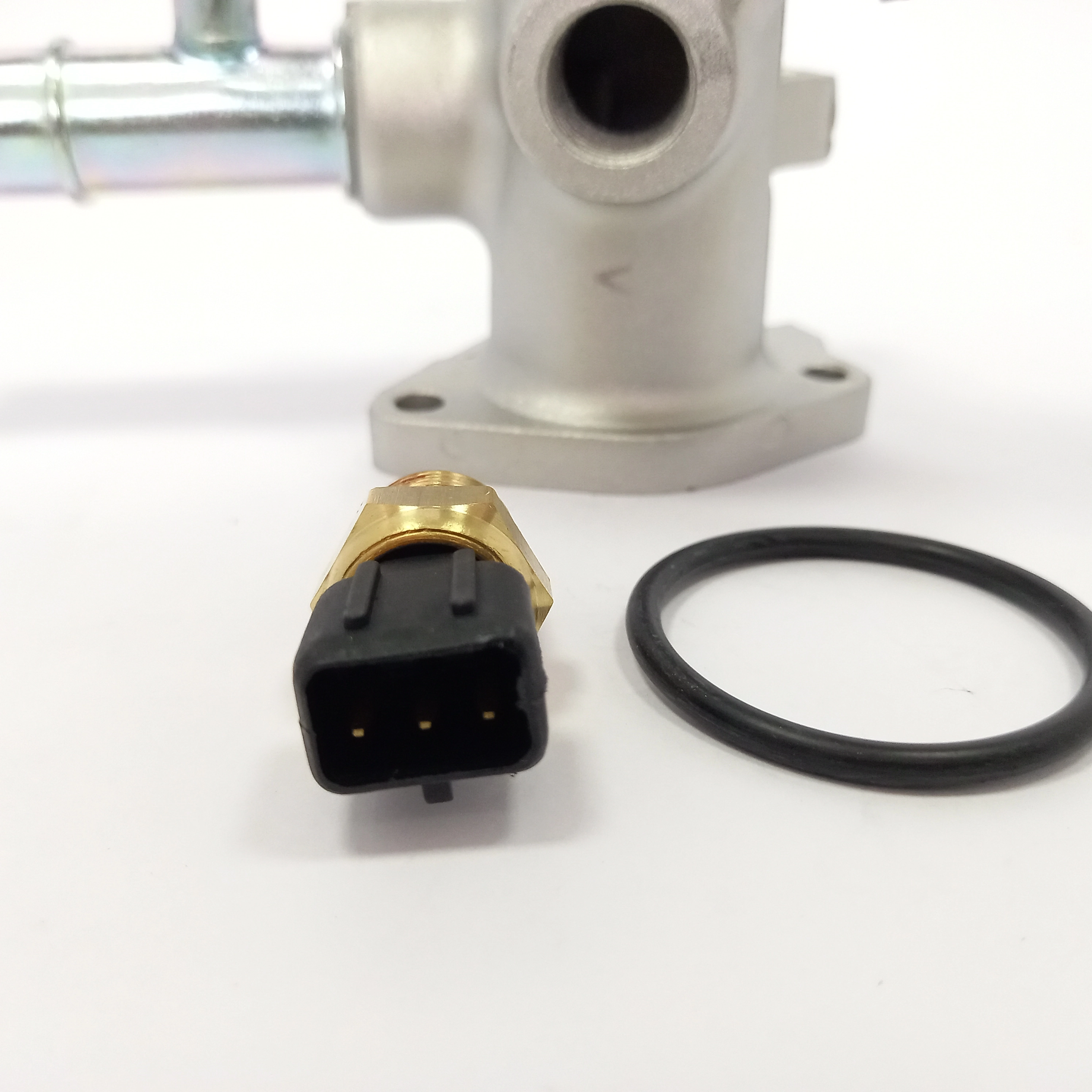 FLANGE VÁLVULA TERMOSTÁTICA HYUNDAI HB20 11/16 - I30 13/14 - KIA CERATO 09/ 1.6 16V - COM SENSOR