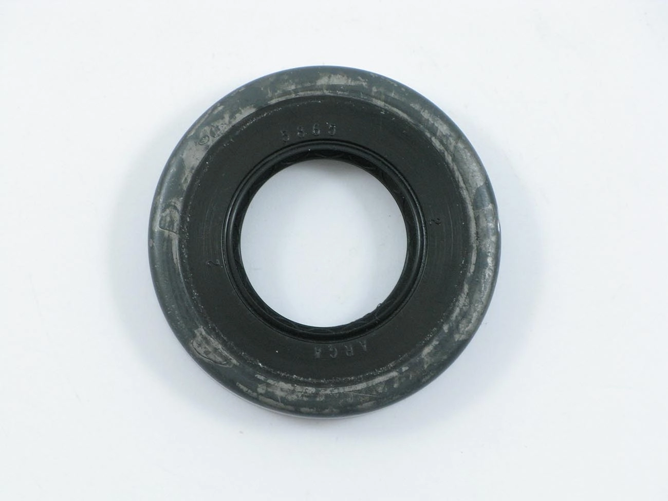 RETENTOR SAÍDA CÂMBIO/ENTALHADO GM S-10/BLAZER 98/ 4X4 FLANGE CARDAN TRASEIRO - 30X58,10X11MM