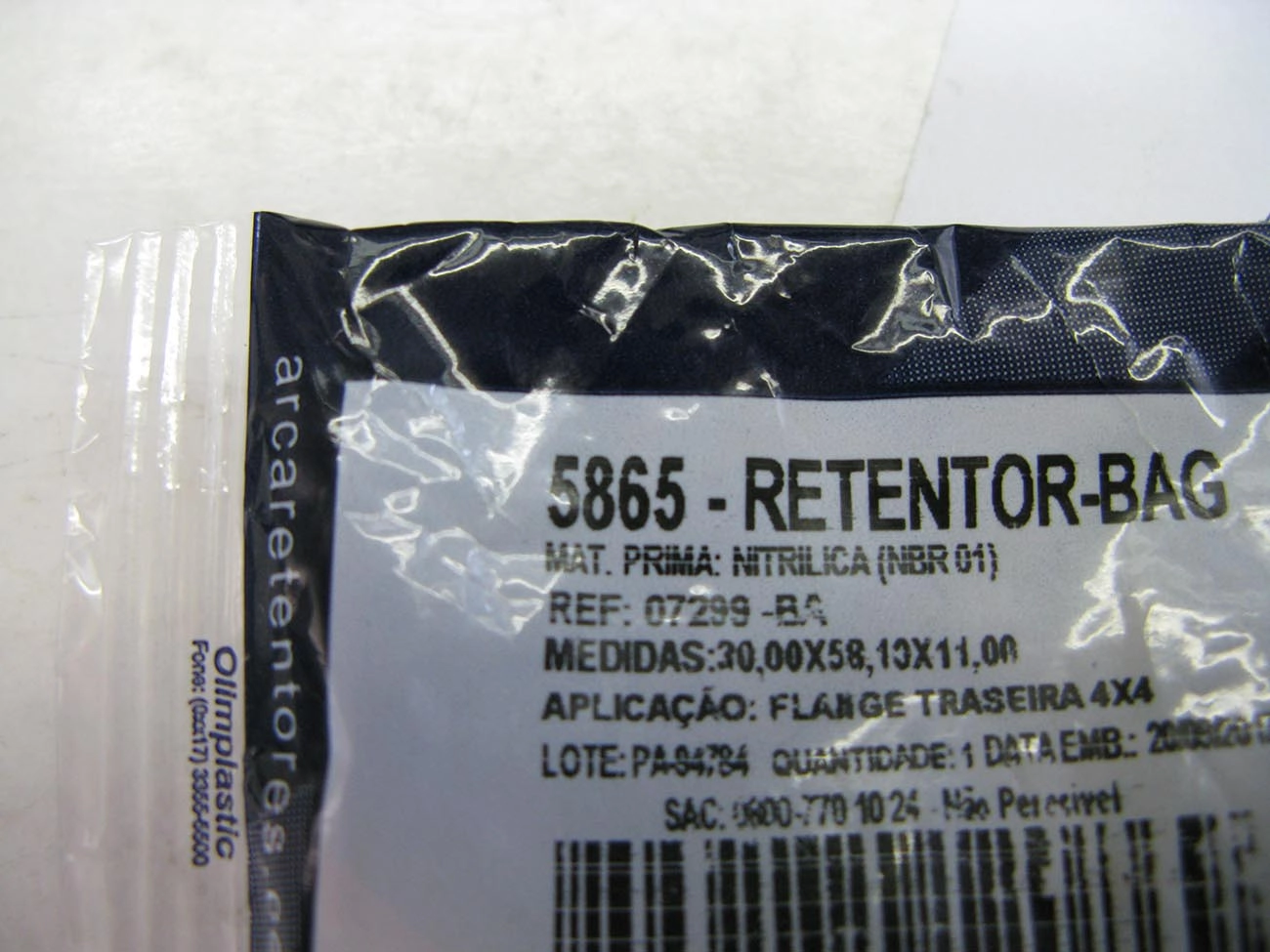 RETENTOR SAÍDA CÂMBIO/ENTALHADO GM S-10/BLAZER 98/ 4X4 FLANGE CARDAN TRASEIRO - 30X58,10X11MM