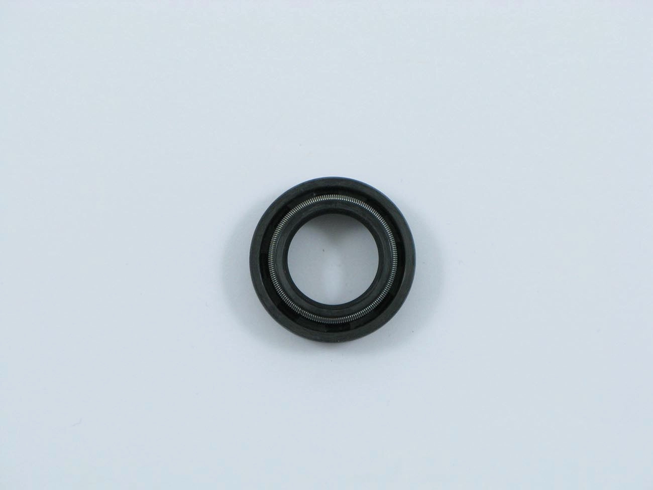 RETENTOR CÂMBIO EIXO PILOTO FORD CORCEL/BELINA/DEL REY/PAMPA 69/89 - 17X28X7X10MM