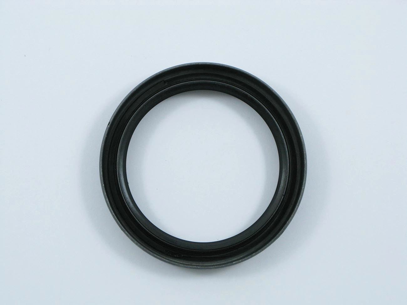RETENTOR EIXO ENTALHADO/SAÍDA CAIXA CÂMBIO 58,00X75,00X12,00MM MB 709/812/912/1111/1113/1313/1513/2013 58X75X12MM