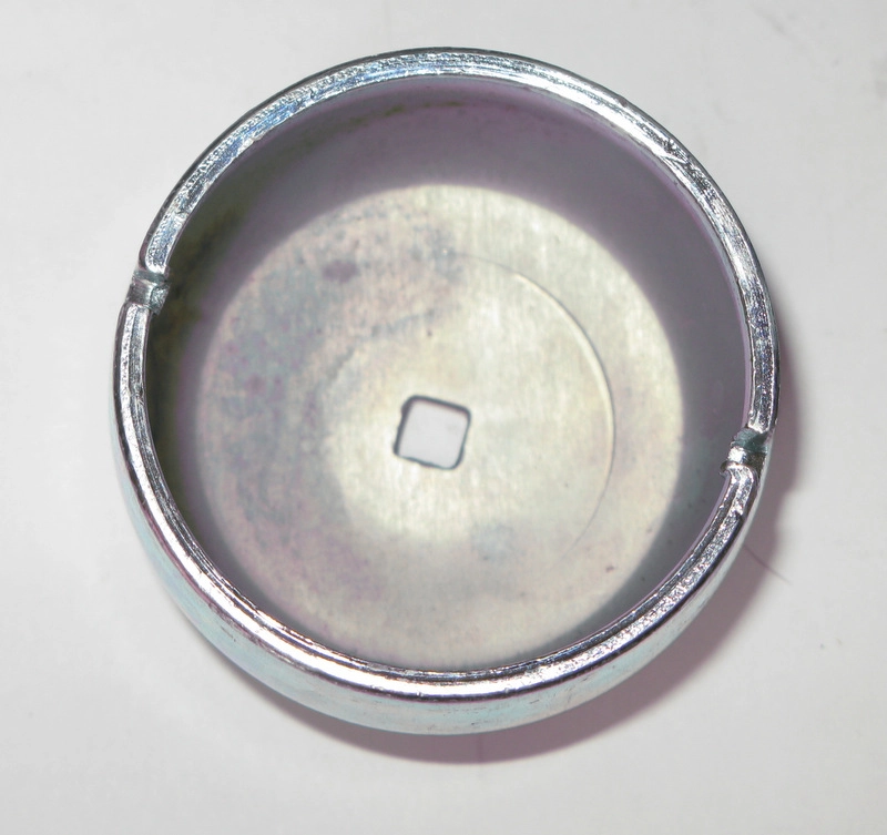 CALOTA CUBO RODA DIANTEIRA ESQUERDA COM FURO GRAXA 53MM VW FUSCA /74