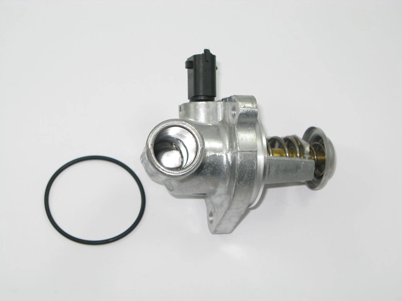 VÁLVULA TERMOSTÁTICA ELÉTRICA COM FLANGE ALUMÍNIO SENSOR MOTOR ZETEC ROCAM FLEX ALUMÍNIIO FORD FIESTA/KA/ECOSPORT 05/06