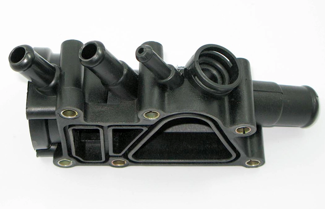 CARCAÇA/FLANGE PLÁSTICO VÁLVULA TERMOSTÁTICA CAVALETEDE DISTRIBUIÇÃO ÁGUA MOTOR ZETEC ROCAN FORD KA/FIESTA/NOVO FIESTA/COURIER 99/ FOCUS 1.6 03/