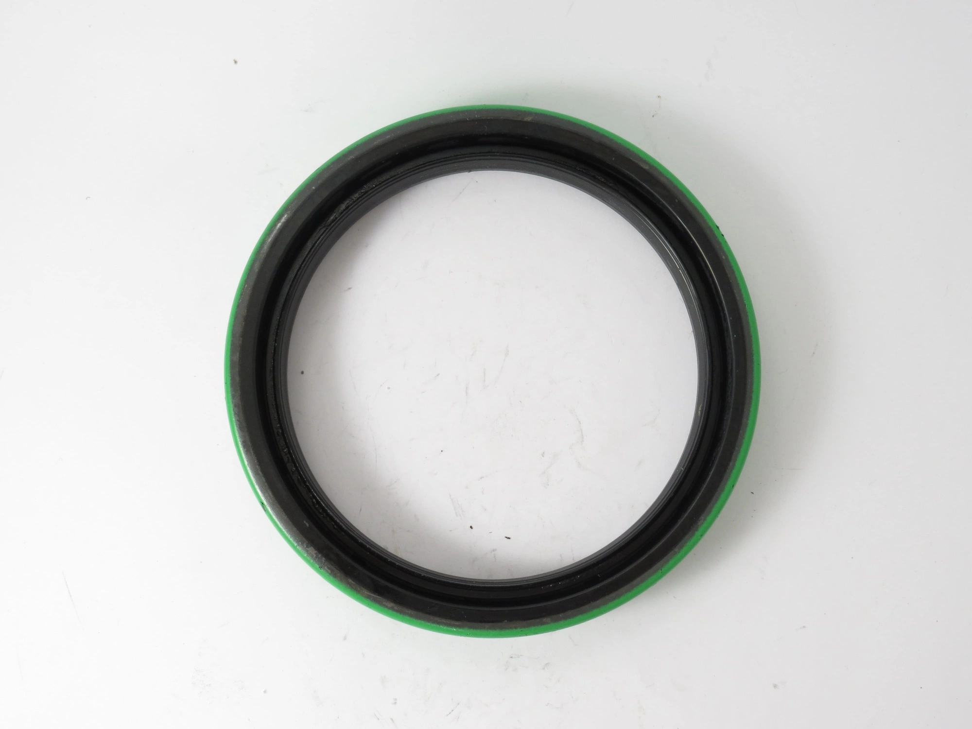 RETENTOR CUBO DE RODA DIANTEIRA VALTRA/VALMET 128/148 - 127X158,83X24MM