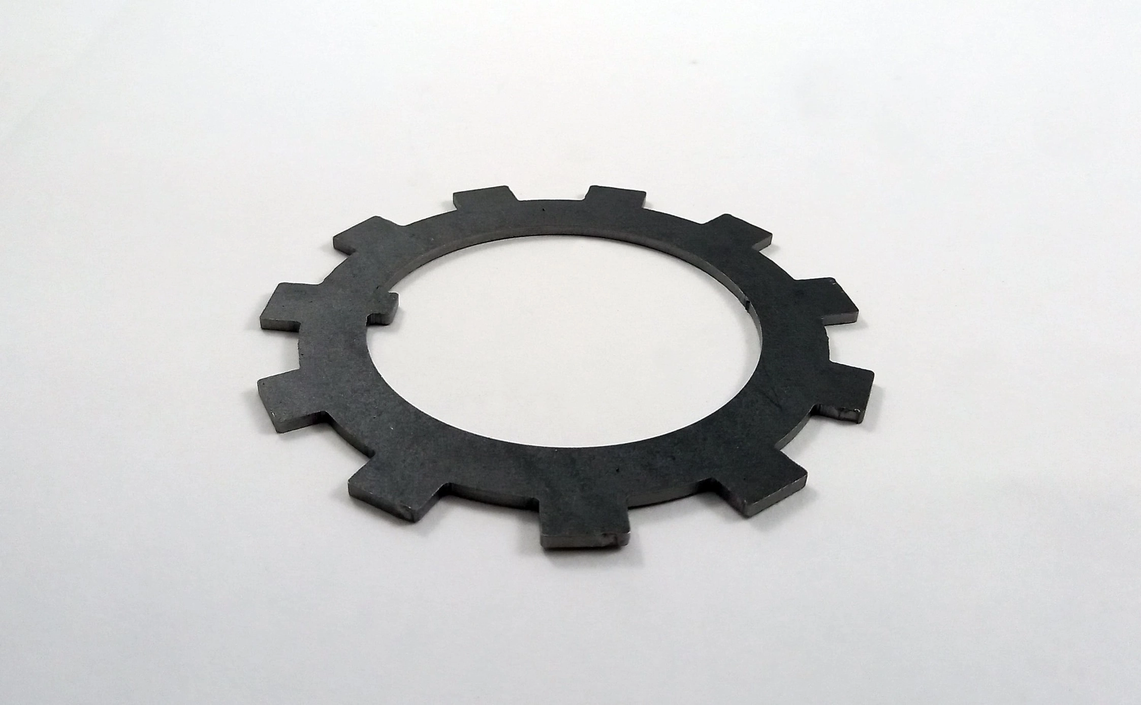 ARRUELA/TRAVA ARANHA 67MM VW 11/12/13/14.130 FREIO A AR - FORD F750/13000 A F22000 /92 - GM D70