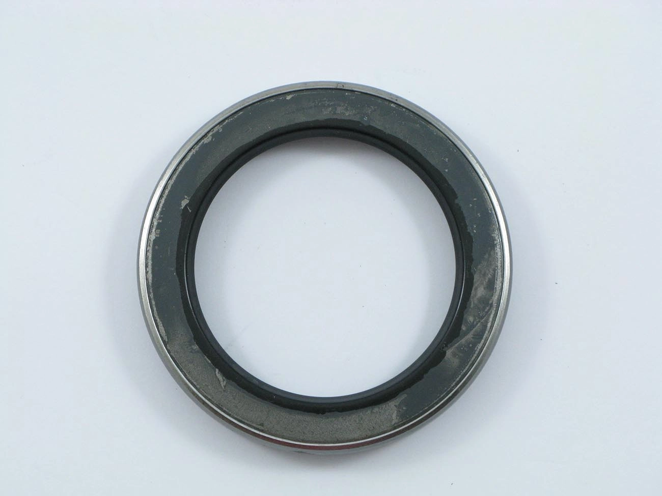 RETENTOR CUBO RODA DIANTEIRO INTERNO 60,20X84,05X8,00X12,70MM DIANTEIRA GM A-60/C-60/D-60 64/79 D-80 70/79 60,20X84,05X8X12,70MM